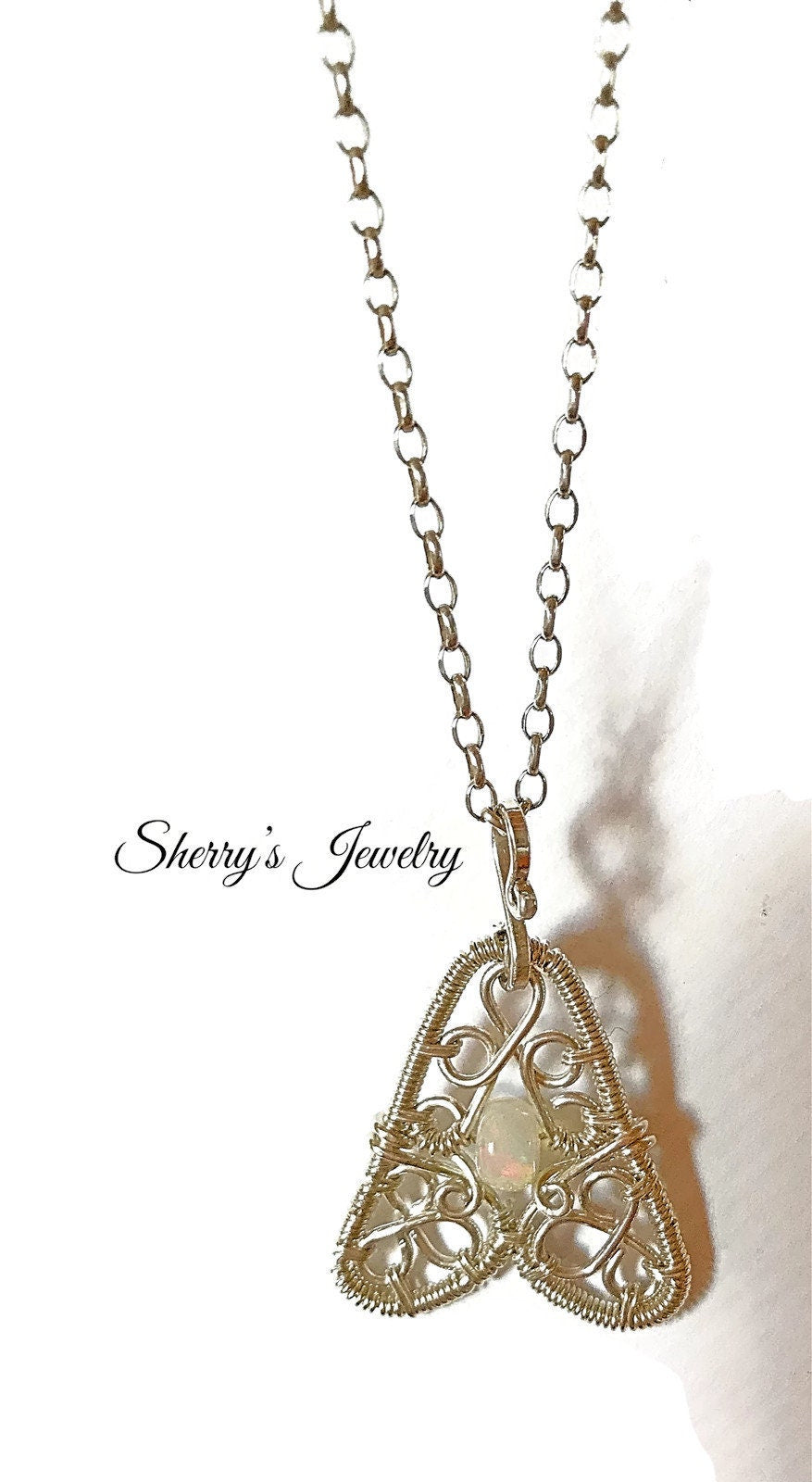 Silver Ethiopian opal charm necklace