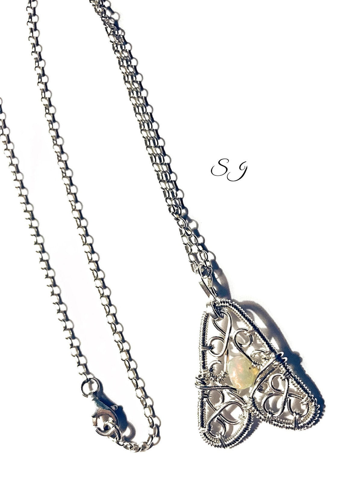 Silver Ethiopian opal charm necklace