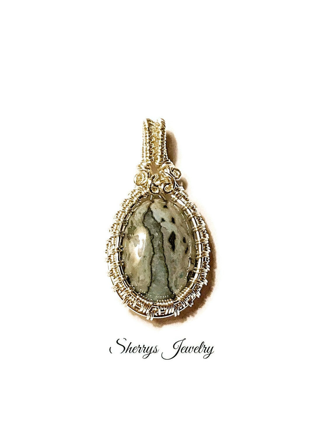 Sterling silver wire wrapped Laguna Lace Agate pendant